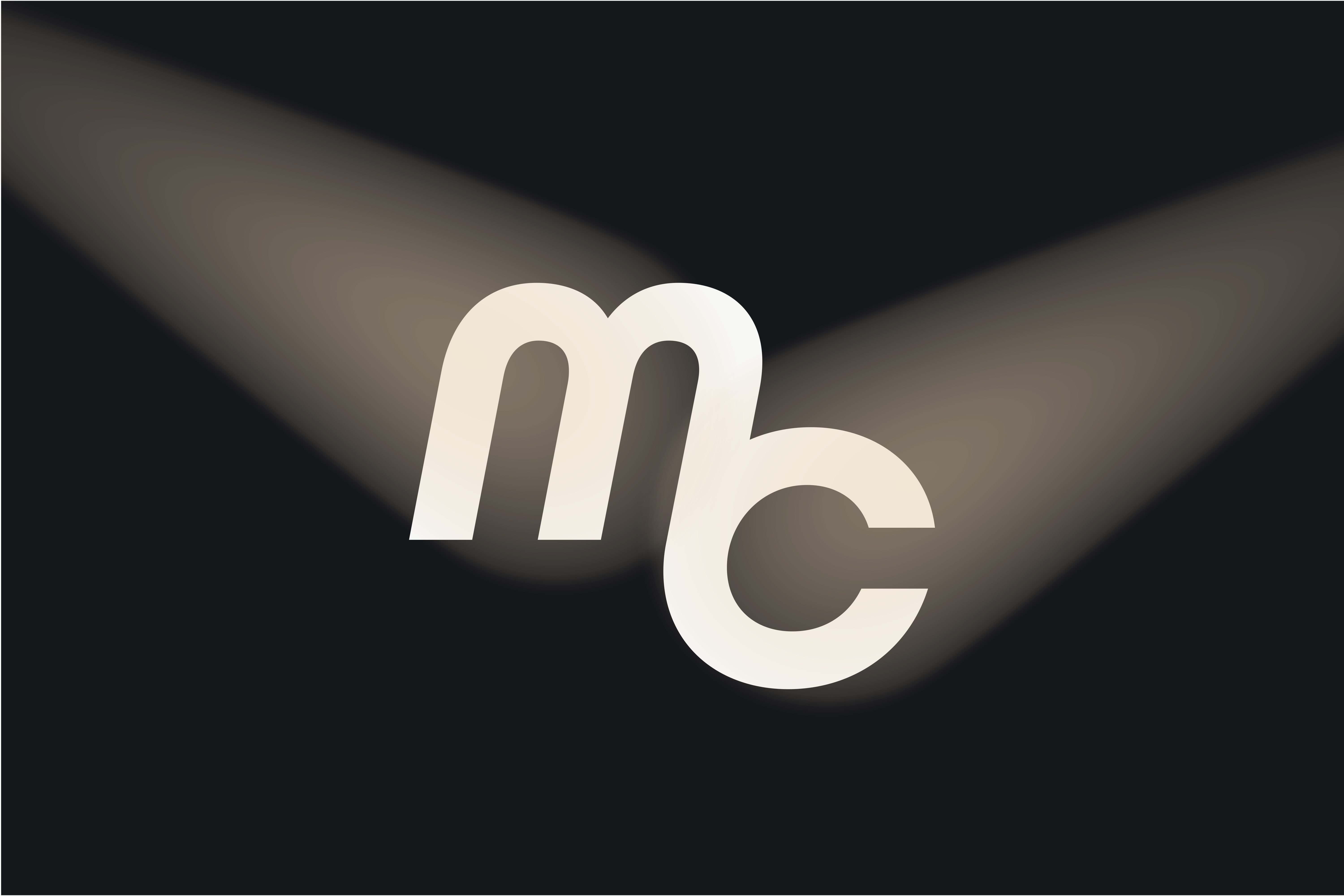 Logo icon with the letters MC lit up by spotlights