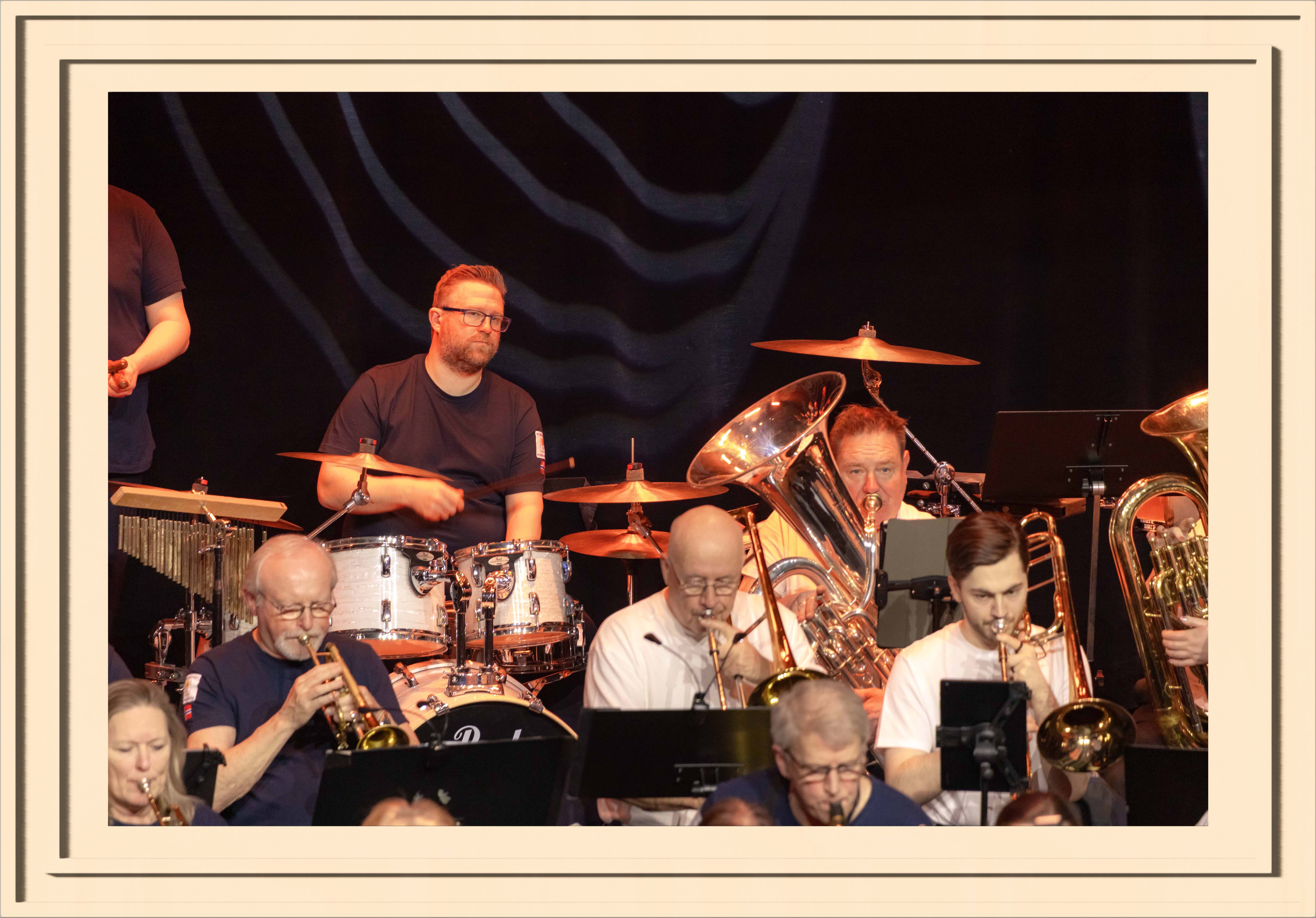 A drummen in orange light
