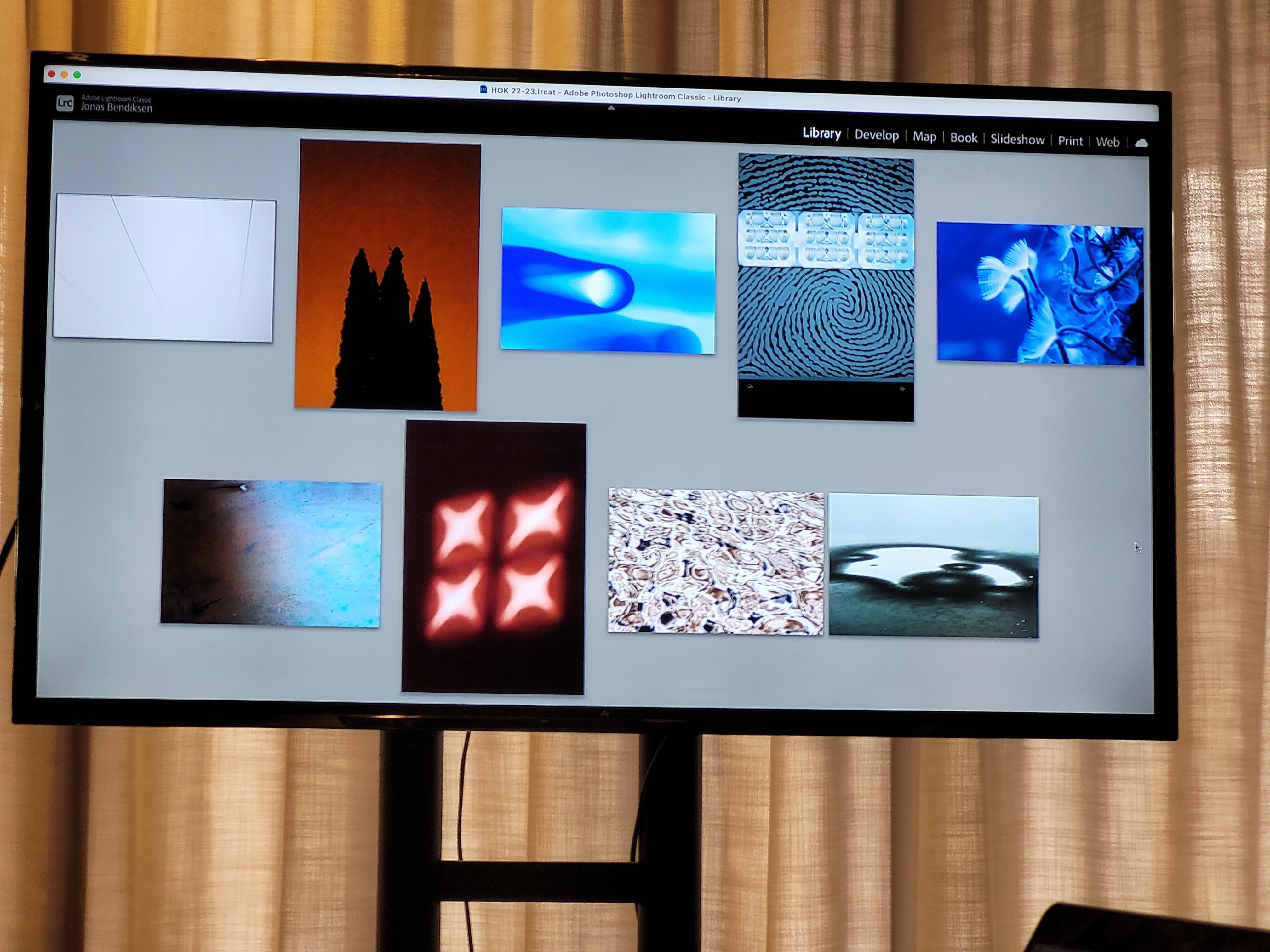 A selection of abstract photos on a tv