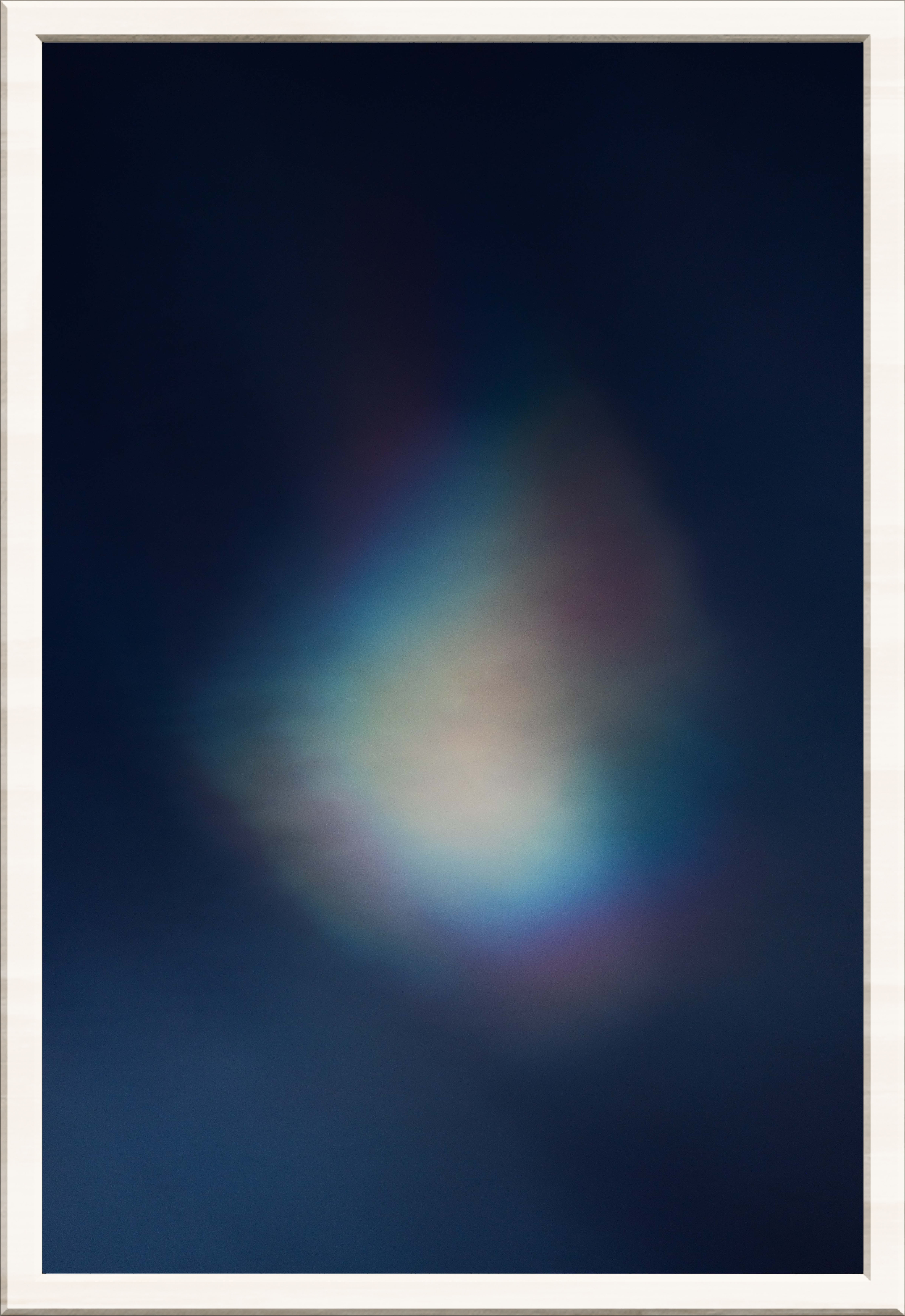 One very diffused rainbow cloud